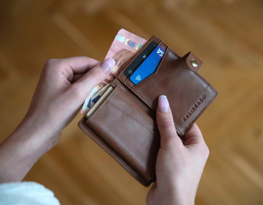 woman holding wallet image
